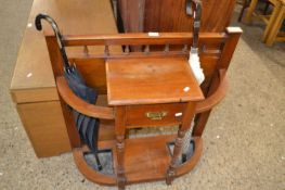 Victorian American walnut stick stand with central drawer