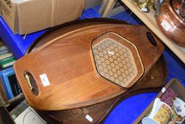An inlaid mahogany kidney shaped tray with brass effect handles together with a contemporary