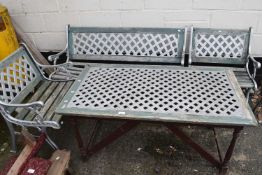 Suite of metal and wooden garden furniture to include a table, bench and two chairs