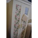 Cream painted and floral decorated wardrobe, approx 80cm wide