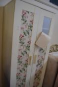 Cream painted and floral decorated wardrobe, approx 80cm wide