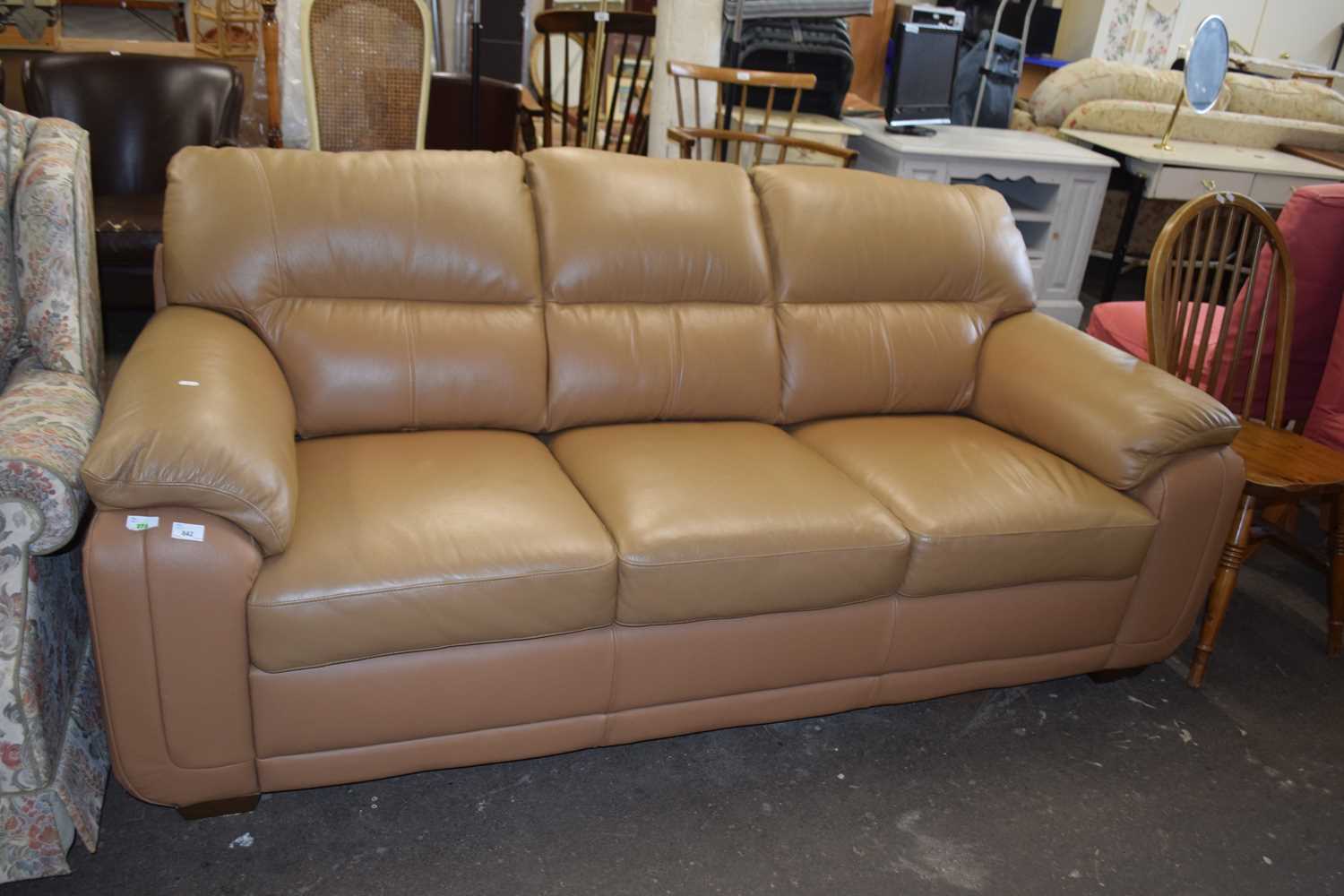 Brown leather three seater sofa