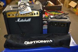 A Marshall MG Series 15CDR amp together with a Burrwood guitar amplifier G-10 and a Vanguard