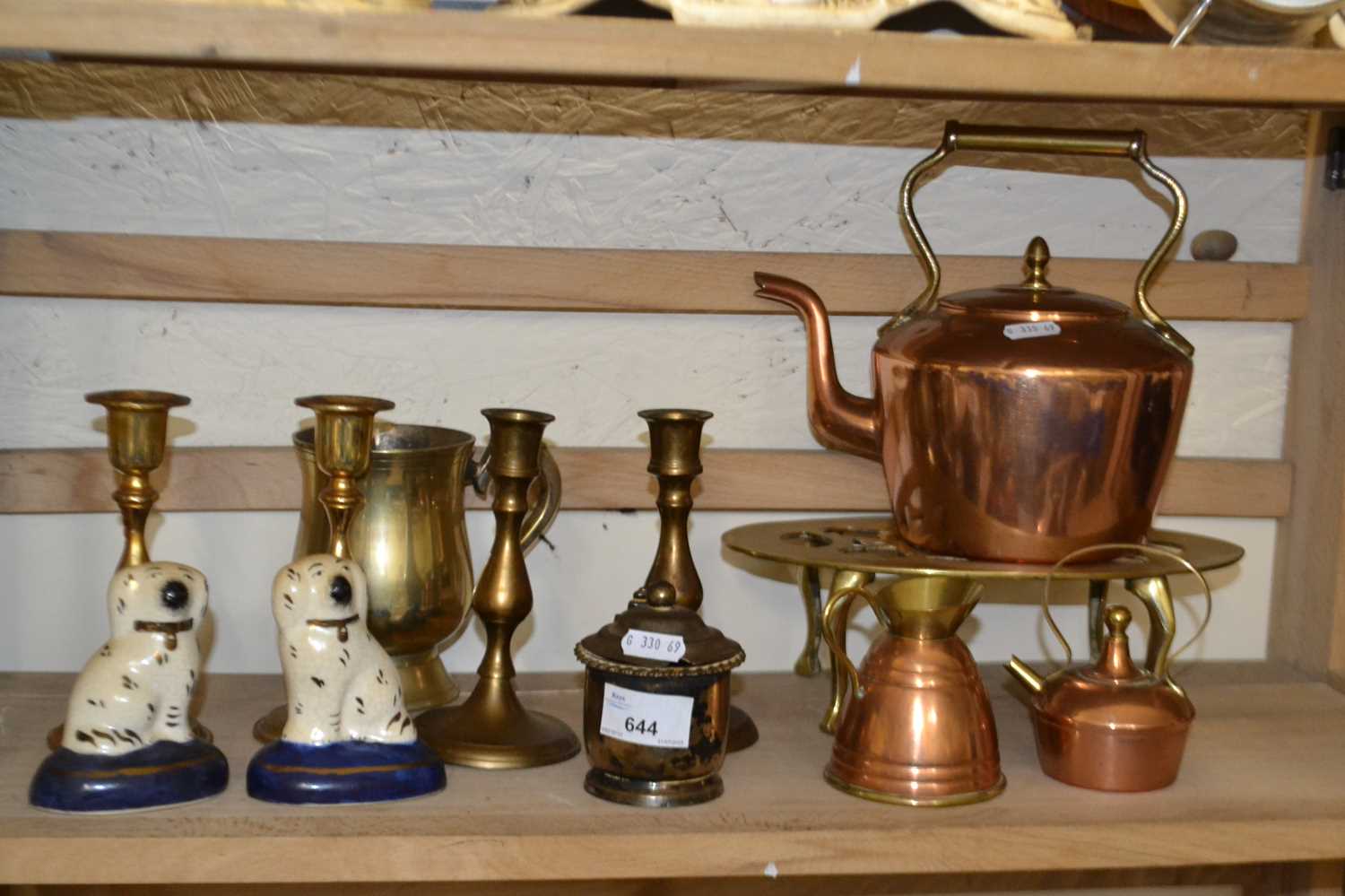Quantity of metal wares to include copper kettle, trivet, dwarf candlesticks and a pair of small