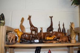 Quantity of assorted carved wooden animals