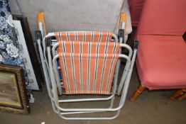 Three folding garden chairs