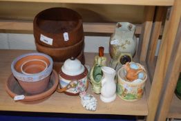 Mixed Lot: Three turned wooden bowls, terracotta planters, Winnie the Pooh mug and other items