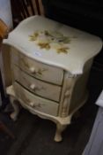 Cream and floral painted three drawer bedside cabinet