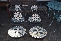 Four metal framed and tile finished garden chairs