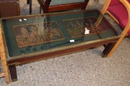 Modern coffee table, the top inset with two heraldic plaques