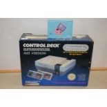 Nintendo NES control deck together with a further game box