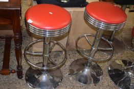 Pair of red bar stools