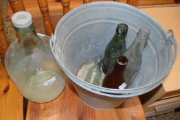 Galvanised bucket and various vintage bottles