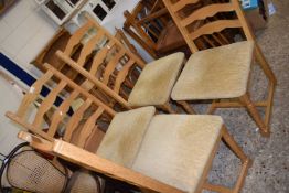 Set of four modern light oak dining chairs