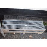 Six sections of drainage grates