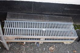 Six sections of drainage grates