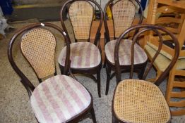 Set of four cane seated chairs
