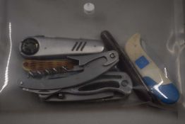A small packet of various pocket knives