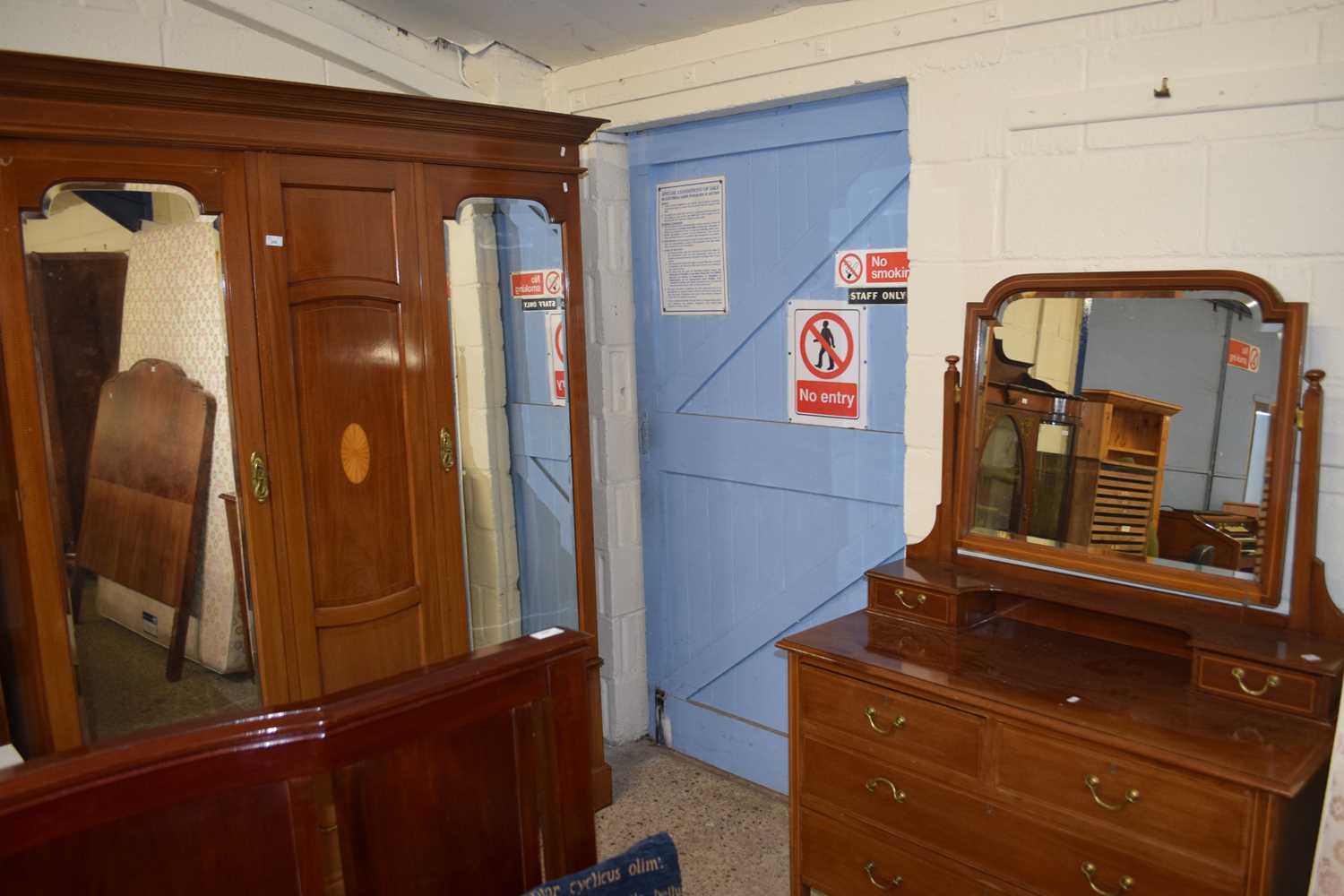 Edwardian mahogany wardrobe together with an acompanying mirrored back dressing chest (2)