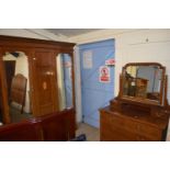 Edwardian mahogany wardrobe together with an acompanying mirrored back dressing chest (2)