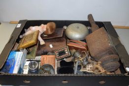 A box of various mixed items to include a small porcelain doll, vintage coaching lamp, travelling