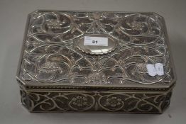 A silver plated jewellery case with blue fabric lined interior