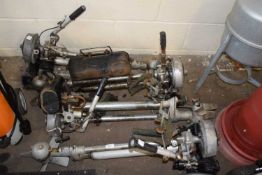 Four various vintage outboard motors