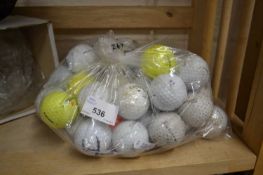 Bag of assorted golf balls