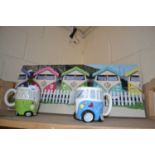 Two novelty VW campervan mugs and a similar picture