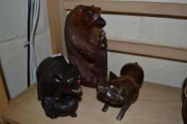 Two carved model bears and a pig (3)