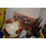 A coppered and paper globe on wooden base together with decanter, pirate ship and other items
