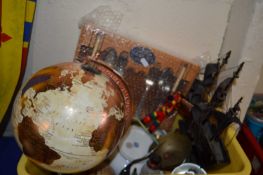 A coppered and paper globe on wooden base together with decanter, pirate ship and other items