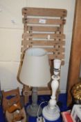 two table lamps and a folding stool