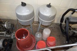 Two metal poultry drinkers and various feeders, trays etc