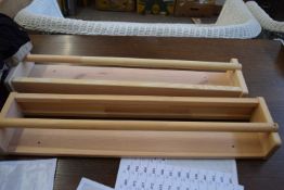 Two wooden towel rails