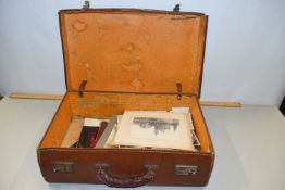Leather case containing various vintage photographs, ephemera etc