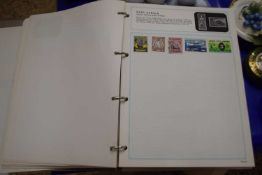 A Stanley Gibbons stamp album and contents