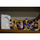 Collection of various modern Walt Disney ceramic figures and accompanying picture frame
