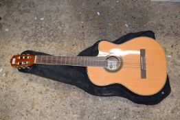 A Gear4Music acoustic guitar, serial number: CG100NT, with black marlin softcase