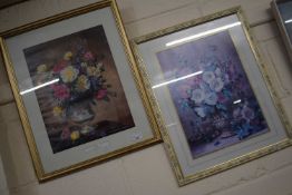 Two framed still life prints of flowers
