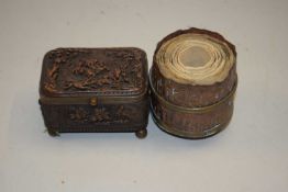 A copper prayer reel and scrolls together with a small fabric lined jewellery box