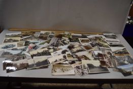 A packet of various topographical postcards