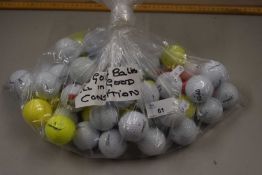A bag of fifty assorted golf balls