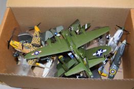 A collection of modern Corgi model WWII and other military aircraft