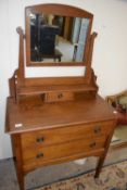 Edwardian oak three drawer dressing chest, 84cm wide
