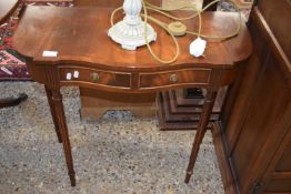 Reproduction mahogany veneered serpentine front two drawer hall table