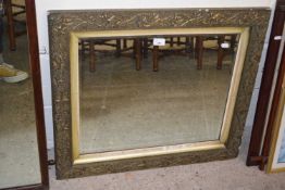Rectangular wall mirror in a gilt finish floral decorated frame, 74cm wide