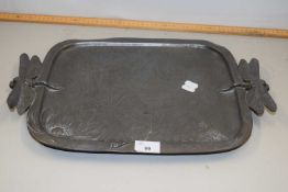 A pewter tray with dragonfly formed handles, 47cm wide