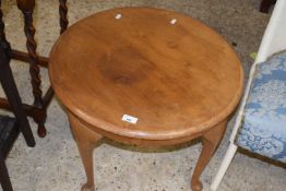 Circular coffee table on cabriole legs