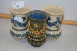 A group of three small Doulton vases with garland decoration